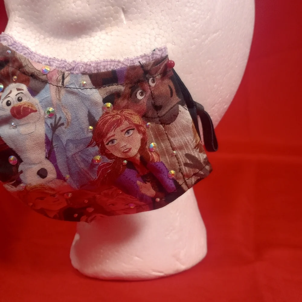 SKU 900KM Frozen Pattern With Studs, Adjustable Earpieces.
